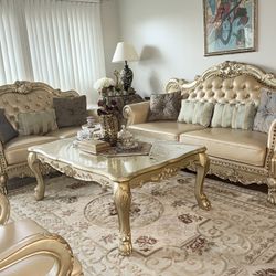 Luxury sofa set & 8–12 person extendable dining table with all chairs included. Like new, very clean. $6,500.