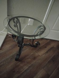 Glass top metal frame table 26 inches wide
