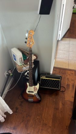 Squier Jazz Bass Guitar and vox amp