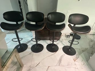 Brand new set of 4 black bar stools / adjustable height / swivel / price is firm (not negotiable) new in box