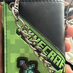 New!! Minecraft Creeper and Diamond Sword Tri-Fold Snap Chain wallet . Located off lake mead and Simmons area asking $20