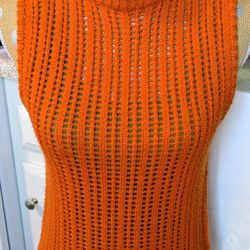 🧡Up. Orange ChunkyKnitVest
Cozy, stylish, and perfect for layering! This vibrant orange chunky knit vest adds a fun pop of color to any outfit.
-