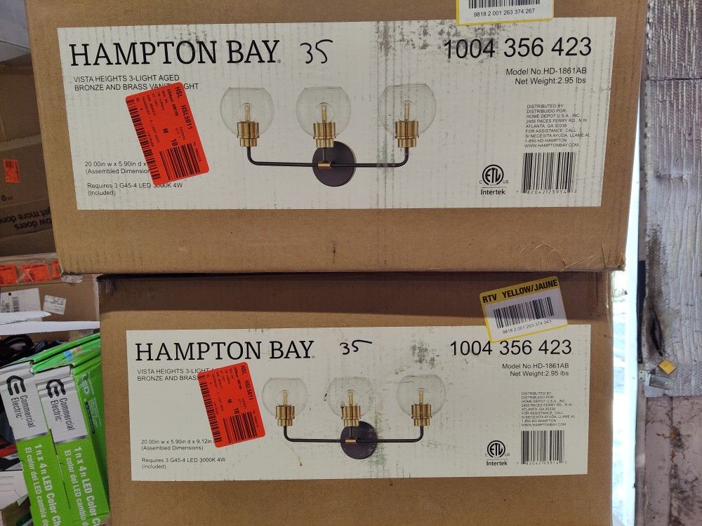 Hampton Bay 3 Light Bathroom Vanity Light Fixture In Aged Bronze And Brass, Few Available 