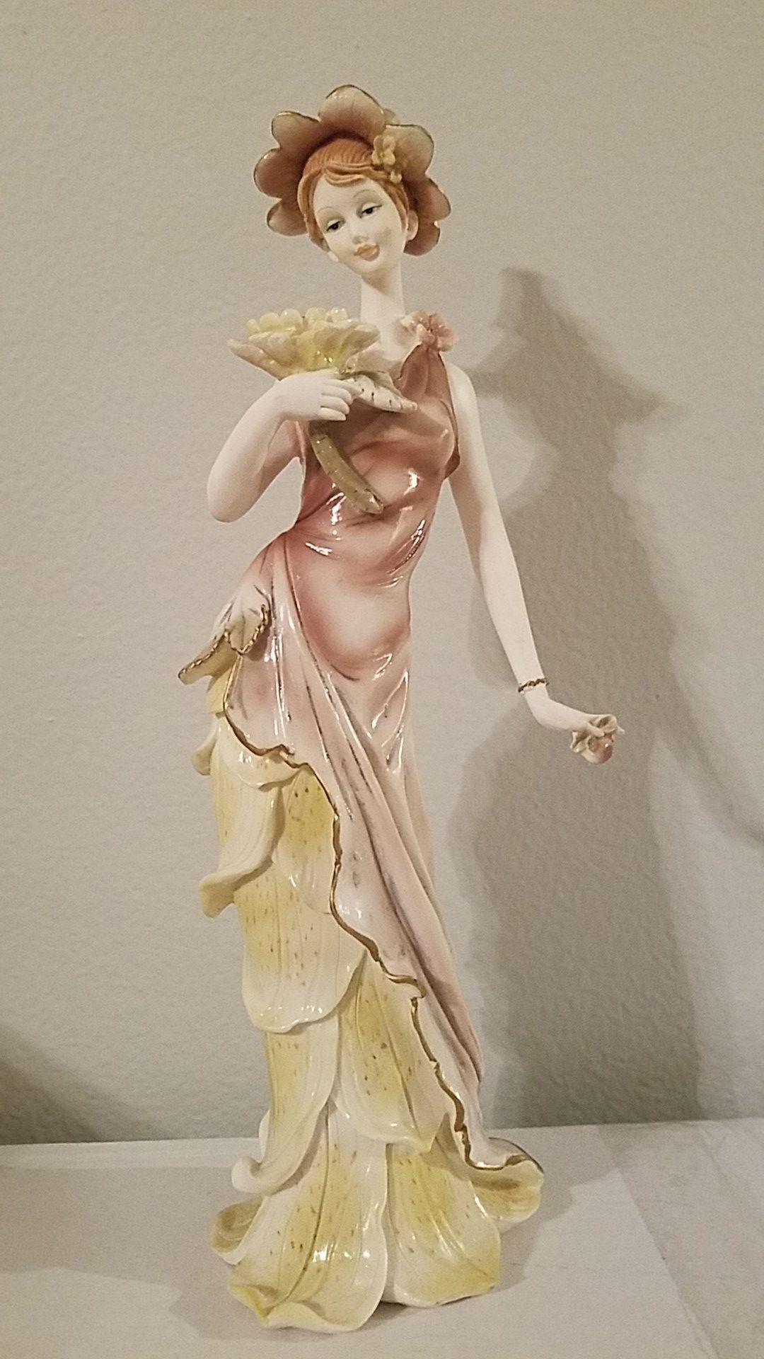 Flower lady figurine