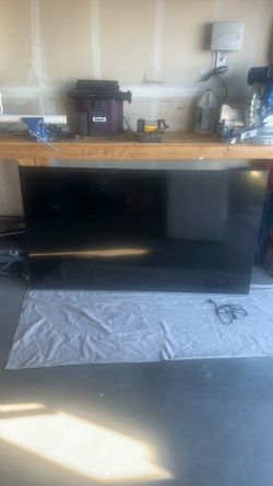 75 inch TV and sound bar.