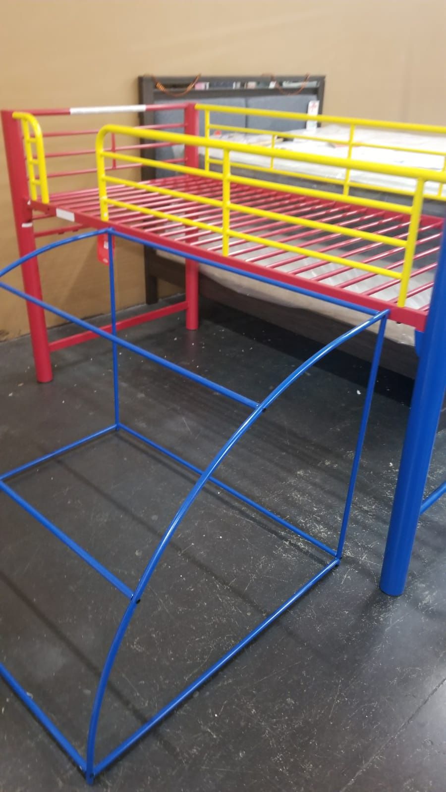 Kids loft bed with a slide and a tent