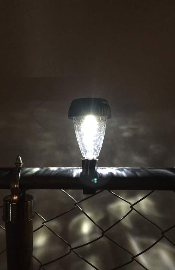 Solar lights for chain link fence. Easy one step click on