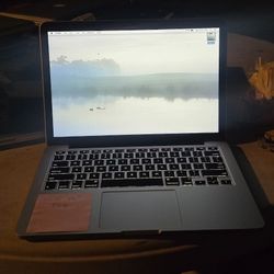 MacBook Pro 13-inch, Early 2015
2.7 Intel Core i5 
8GB RAM 
128 GB SSD 
