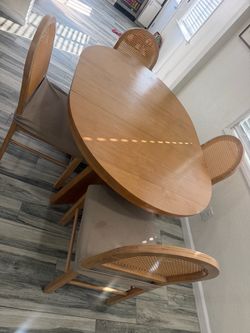 Wood Oval Dining Table with 4 Cane Back Chairs