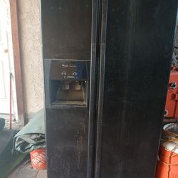 Whirlpool side by side refrigerator