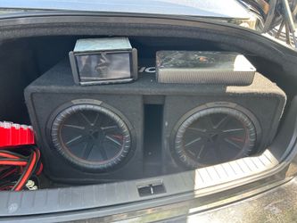 2 12s subwoofers, kenwood deck/ radio, and amp box