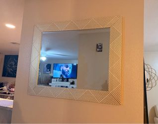 White and gold mirror