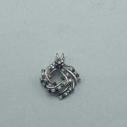 18kt White Gold and .50cttw Diamond Spinning Pendant