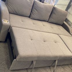 Gray single sleeper sofa with pull out bed with cup holder 82.5"W X 32.5"D X 32.5"H
