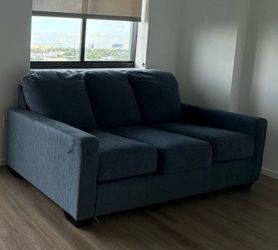 Sofa couch brand new pull out mattress never slept on
