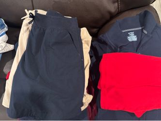 Used Girls Uniform shirts and skirts  size 10/12
