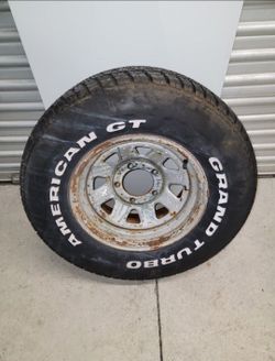 Jeep CJ5 CJ7 CJ8 OEM Factory 15X7 Wagon Wheel 4_28_1982 & An American Grand Turbo GT - 275/60 r15 - Tire
