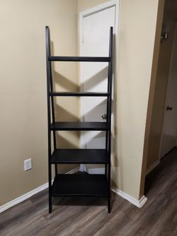 The Wooden shelf is in good condition