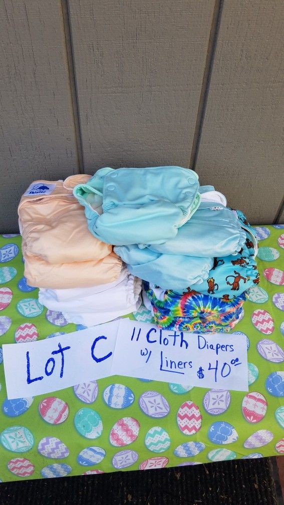 Eleven Cloth Diapers W/Liners