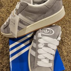 Reduced New Gray Adidas, Size 6.5 $60. Lace up.