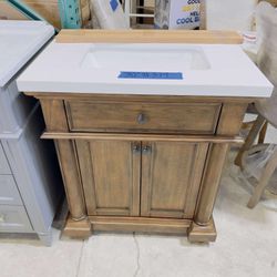 Thomasville 30 in. W x 20 in. D Bath Vanity in Walnut with Quartz Stone Vanity Top in White with White Basin $379 