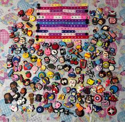 Assorted croc charms and bracelets