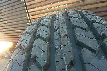 Brand new ridgerunner radial AP 225 75 16 mud and snow