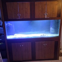 125-gallon  tank and cabinet 