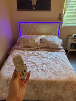 Full sized bed frame with LED lights and drawers