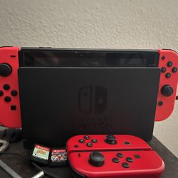 Nintendo Switch + Red Joycons + Animal Crossing + Mario Kart