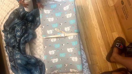 Diaper changing pad with cover sheet