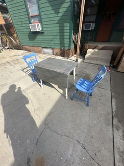 Extendable Table W/ Chairs