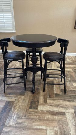 Dark chocolate bar table with 3 solid stools