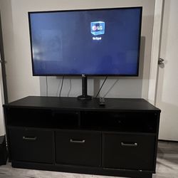 TV Stand with mounted TV 