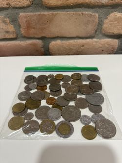 50 assorted coins from different countries.