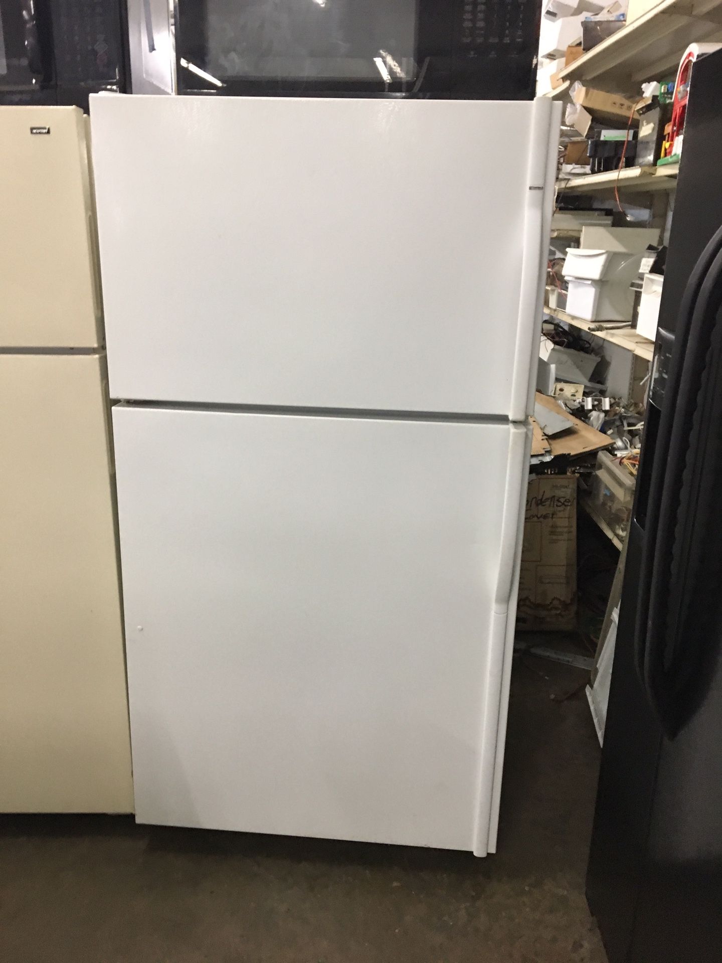 Over 21 ft.³ Guaranteed Refurbished white refrigerator
