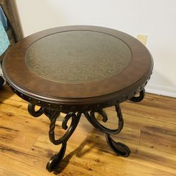  Round end table signature design by, Ashley ,  if you are interested Text me