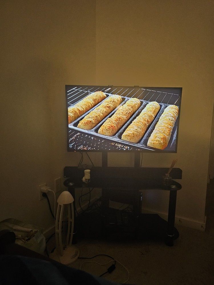 TV. And TV Stand 30 Inches /32