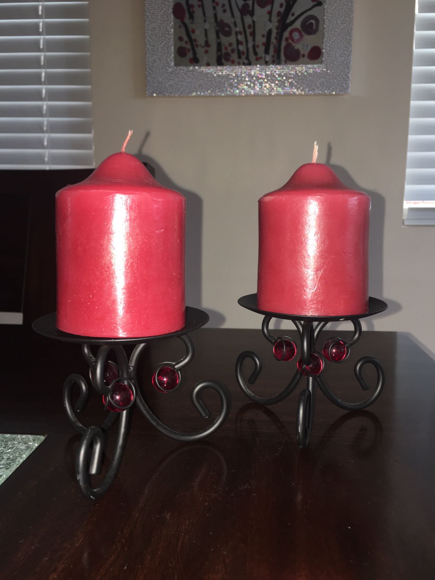 Set of 2 candle holders swirl design, with candles