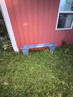 Bench between two planters