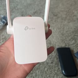 TP-Link 300 Mbps WiFi Extender – $15