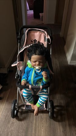Reborn baby’s stroller and  1 boy