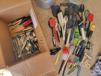Kitchen ware, lots of flatware and kitchen utensils