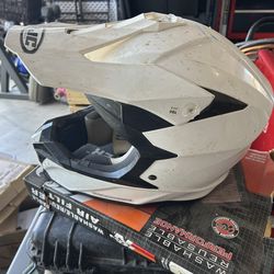 2 motorcycle helmets and chest protector