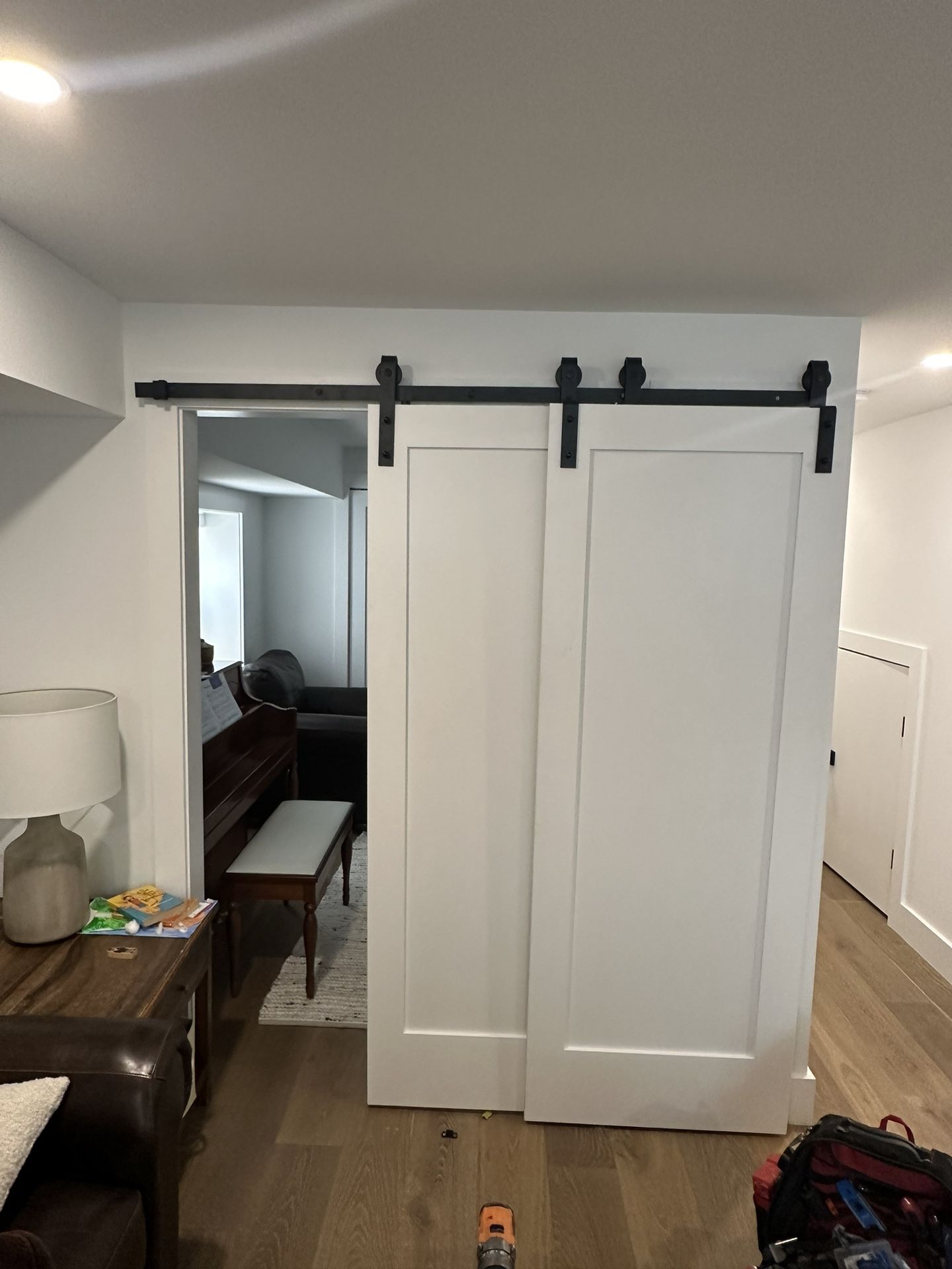 Wood barn doors w/ black hardware 