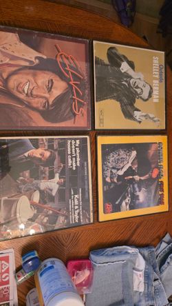 61 records total + 8 record sleeves with no records in frames