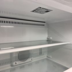 Monogram 24”  under counter refrigerator (new) panel ready