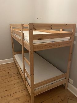 Ikea twin bunk beds pinewood unfinished comes with a bottom storage rack which rolls underneath the bed