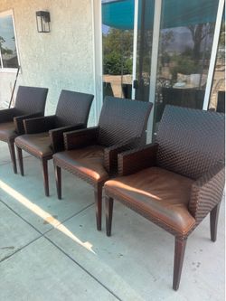 Woven leather chairs by henredon