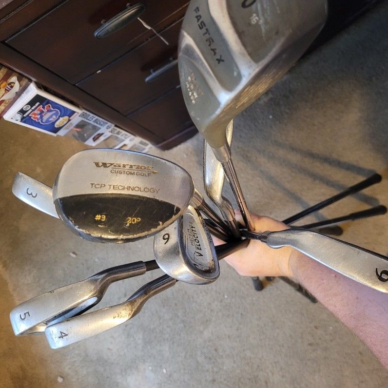 Well Used Set Of Golf Clubs